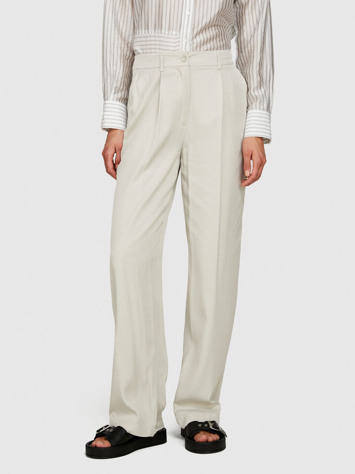 Low-waisted flared fit trousers - women's flared trousers - Beige | Sisley image number 4